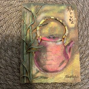 # Vintage Tail with kettle and flowers.